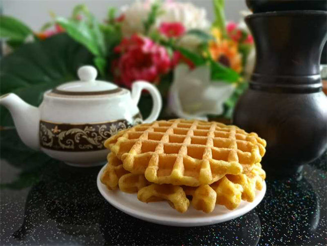 Guangzhou Yitong: What is the working principle of the eight mode soft waffle machine?