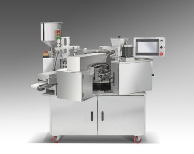 How does the automatic Chicken rolls machine realize automatic grouting?